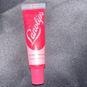 Never used LANOLIPS lip balm (box ripped in transit)